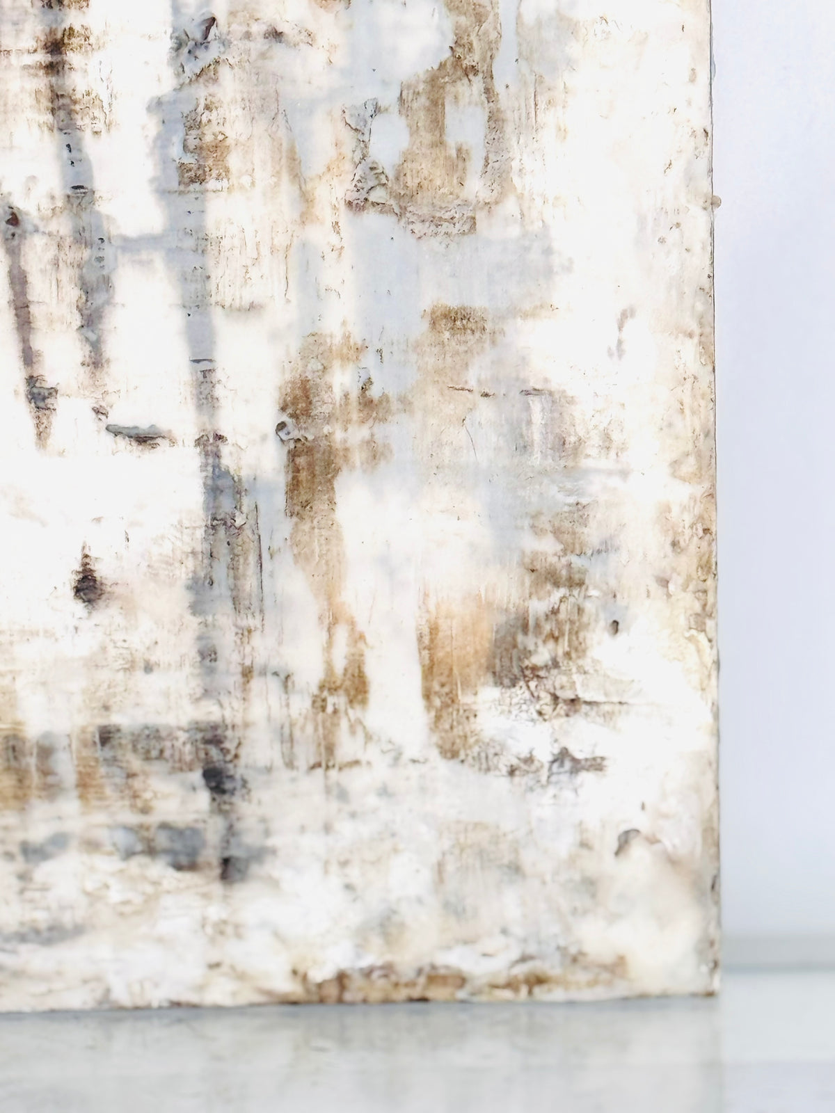 Close-up detail of encaustic surface, layered wax and dry earth pigments, ADALÉI Studio