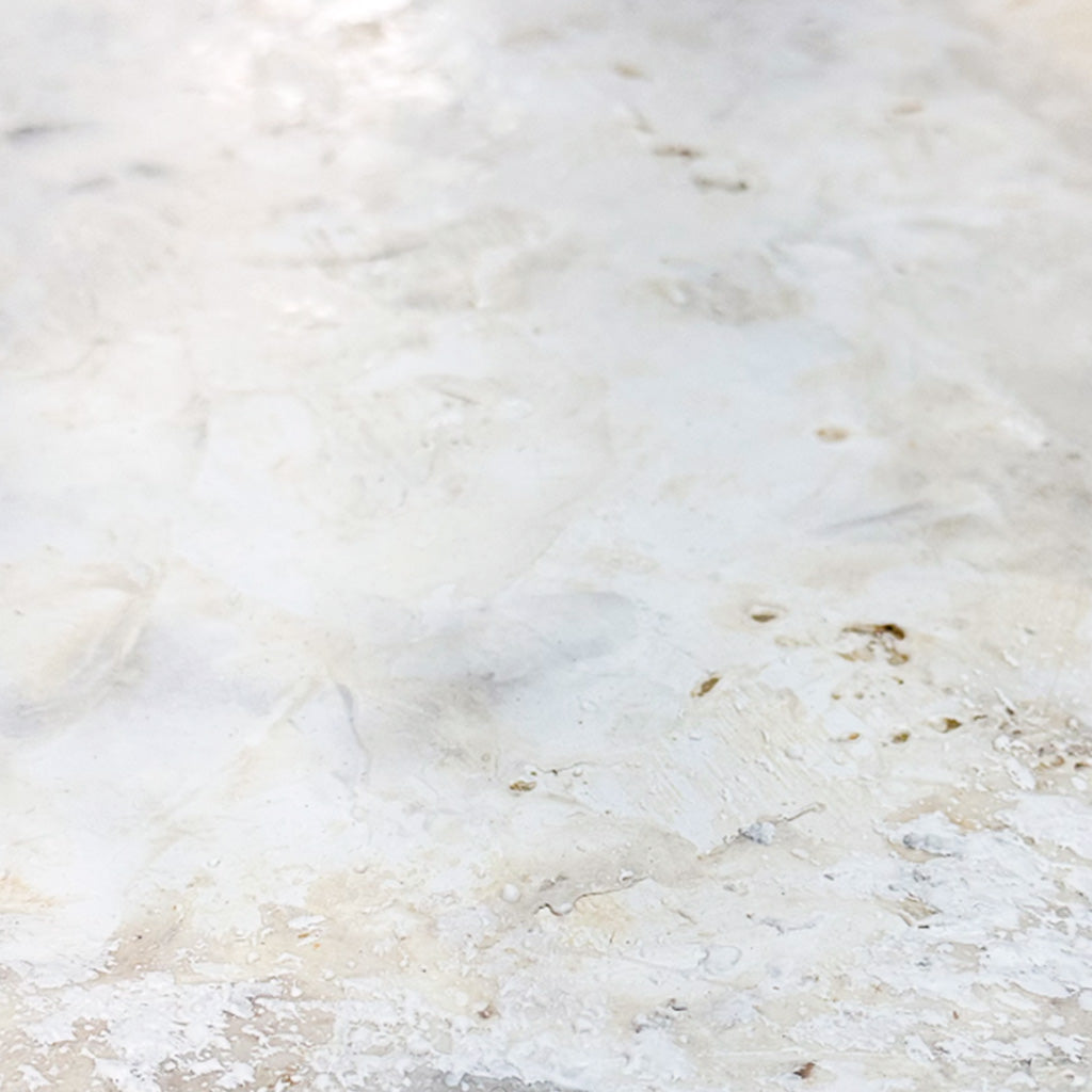 Close-up of encaustic wax surface, Remaining Light, pale ivory and grey with layered pigment and resin, ADALÉI Studio

