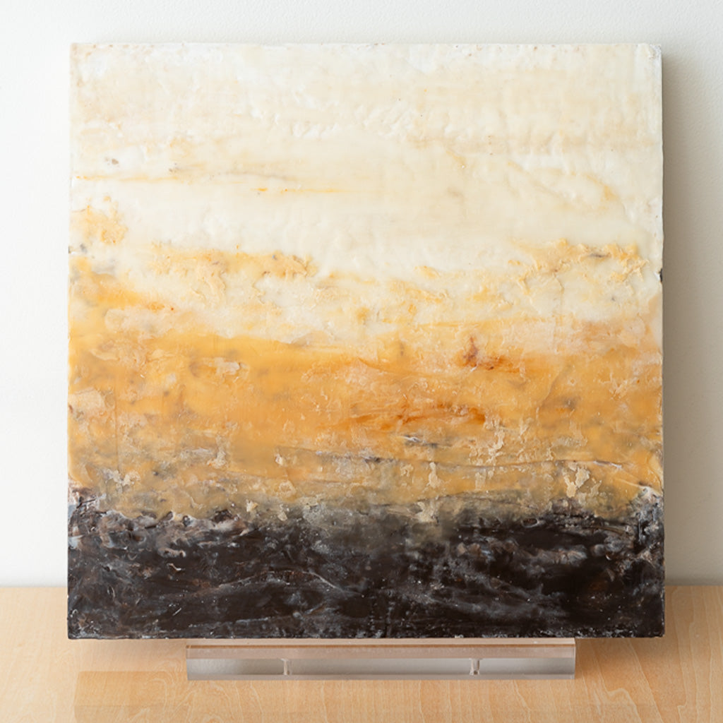 Color gradiant encaustic art with brown, orange, cream wax and pigment 