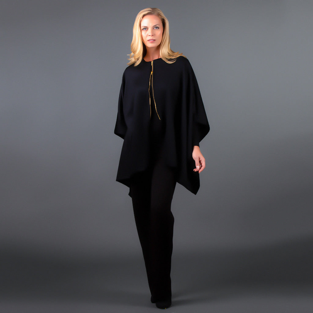 Front view of black cashmere wool cape with brass zipper